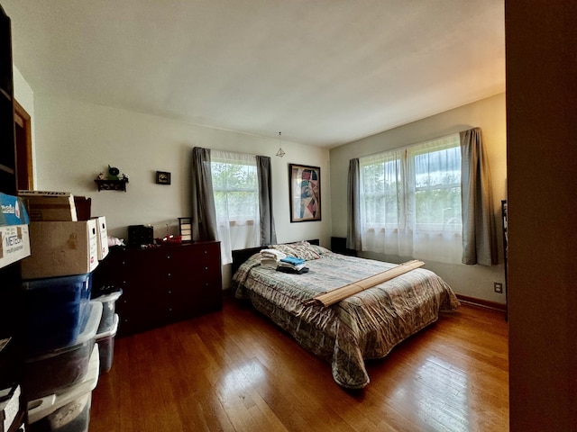 bedroom featuring wood-type flooring