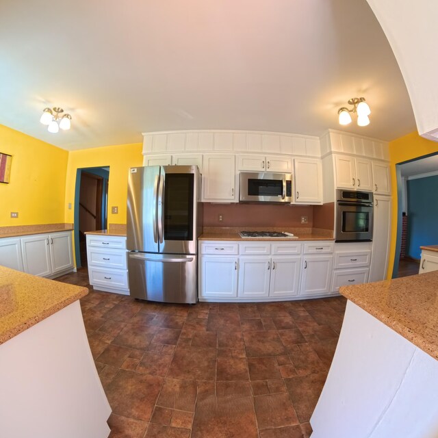 living room featuring hardwood / wood-style floors, ornamental molding, and a textured ceiling