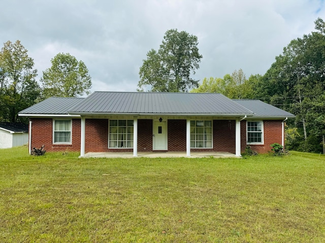 ranch-style home with a front yard