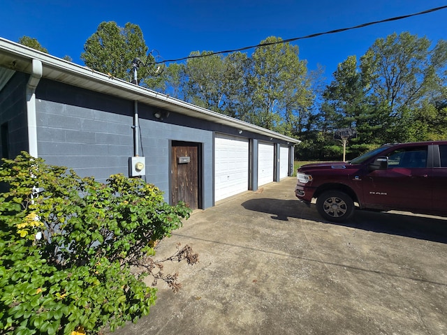 view of property exterior featuring a garage