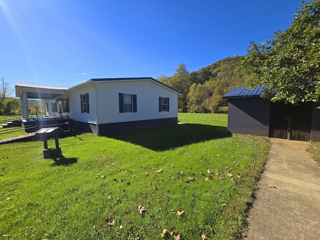163 Eulett Ln, Vanceburg, KY 41179 - view of property exterior featuring a yard