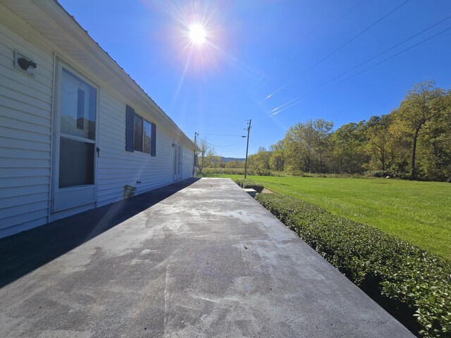 163 Eulett Ln, Vanceburg, KY 41179 - view of home's exterior with a lawn and a patio