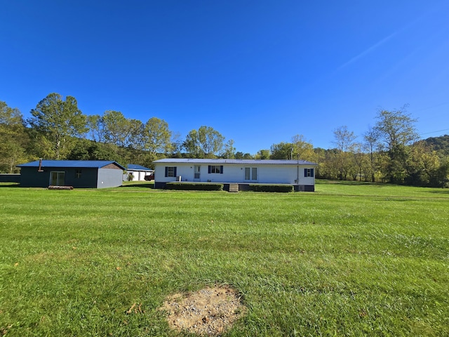 163 Eulett Ln, Vanceburg, KY 41179 - back of property featuring a lawn