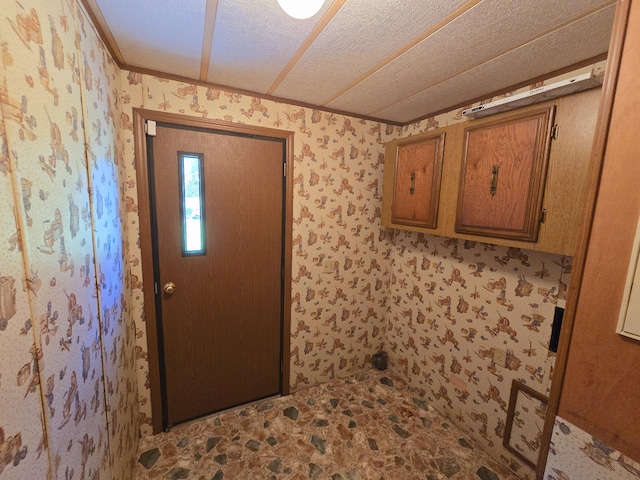 163 Eulett Ln, Vanceburg, KY 41179 - entrance foyer featuring crown molding and wallpapered walls