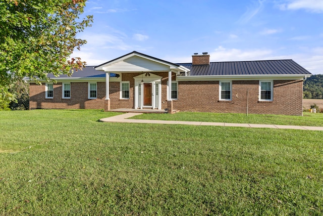 ranch-style house featuring a front yard