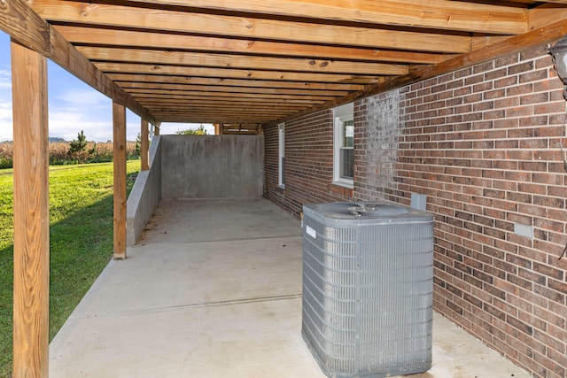 view of patio with central AC unit