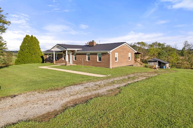 ranch-style house with a front lawn