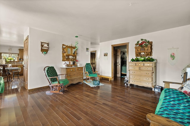 living room with dark hardwood / wood-style floors