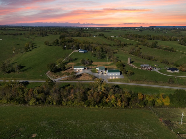 aerial view at dusk with a rural view