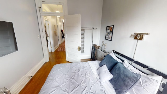 bedroom featuring hardwood / wood-style floors