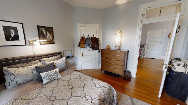 bedroom featuring hardwood / wood-style floors