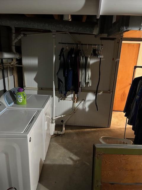 basement with washing machine and clothes dryer