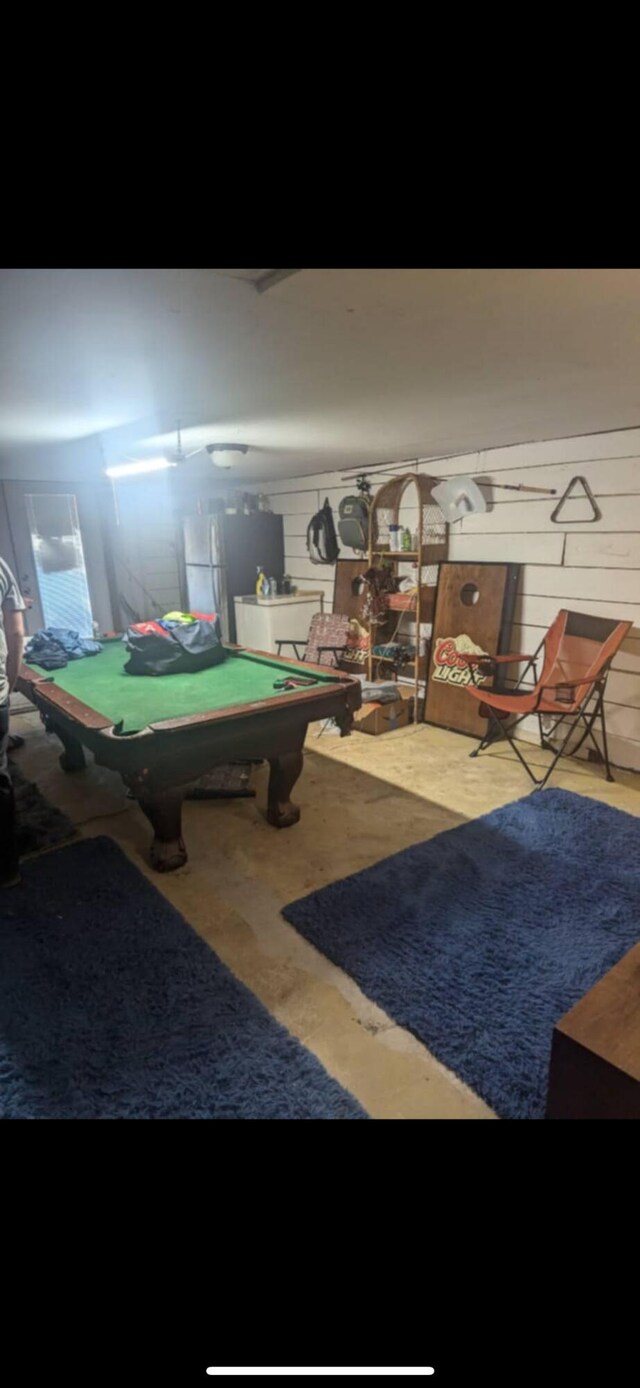 game room featuring concrete flooring and billiards