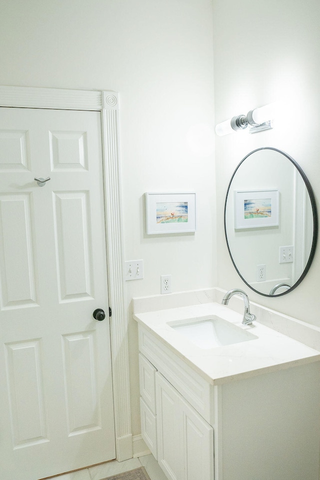 bathroom with vanity and tile patterned floors