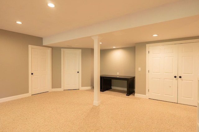 basement with light carpet