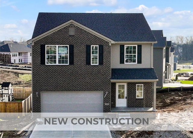 view of front property with a garage