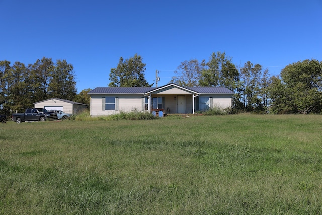 single story home with a front yard