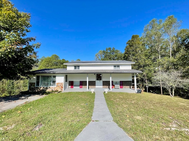 view of front of house with a front yard