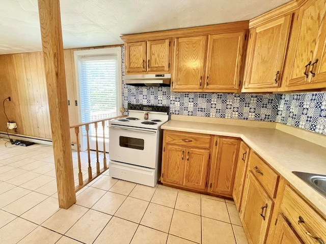 kitchen with electric range, light tile patterned floors, and tasteful backsplash