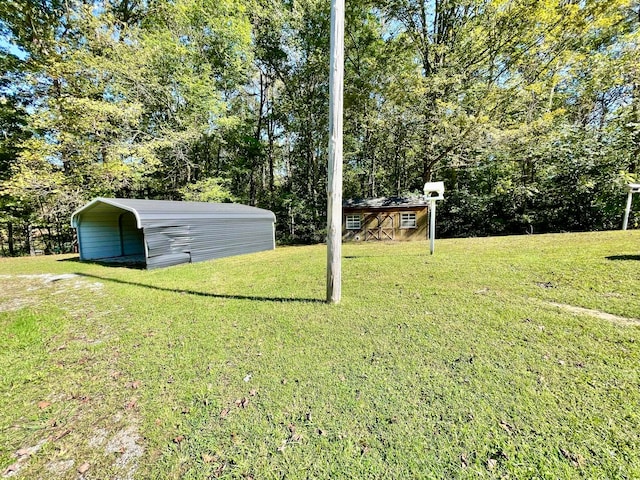 view of yard with a carport