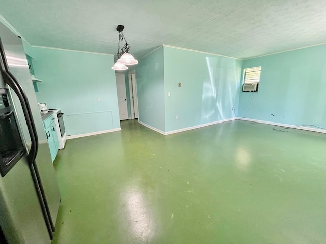 spare room featuring concrete floors and a textured ceiling