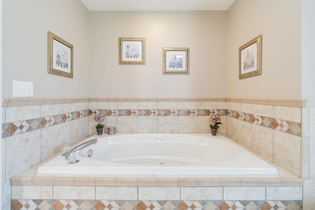 bathroom with tiled tub