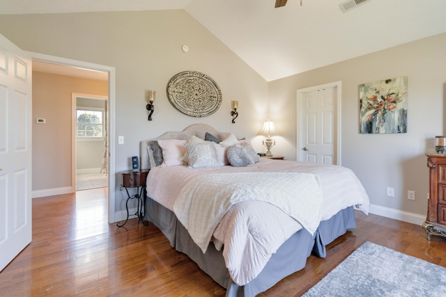 bedroom with wood-type flooring, lofted ceiling, and ceiling fan