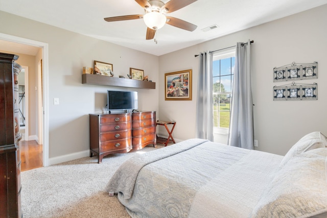 bedroom featuring carpet and ceiling fan