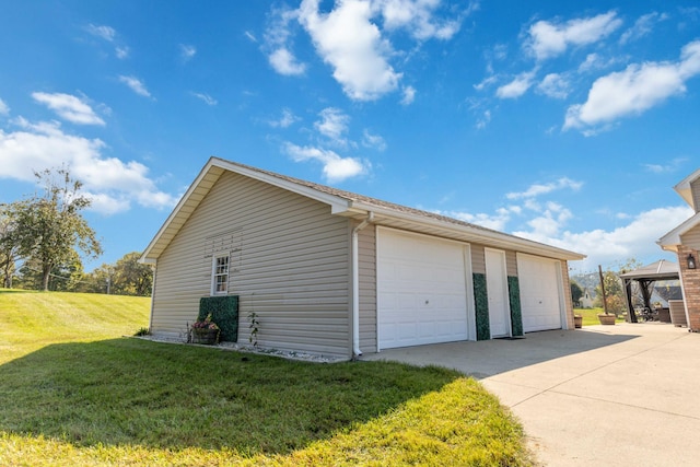 garage with a yard