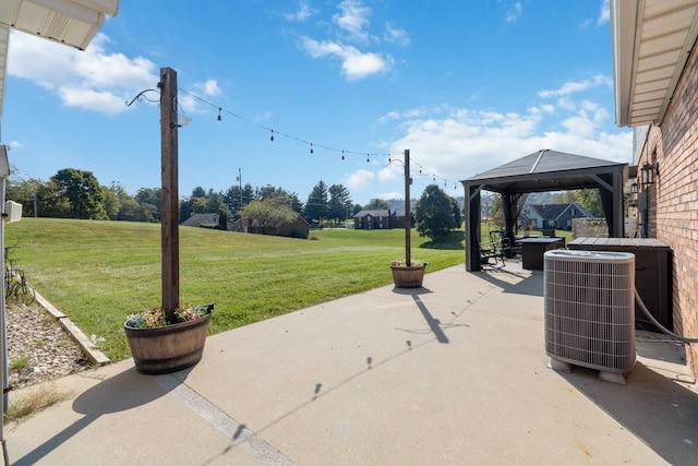 view of patio / terrace with a gazebo and cooling unit