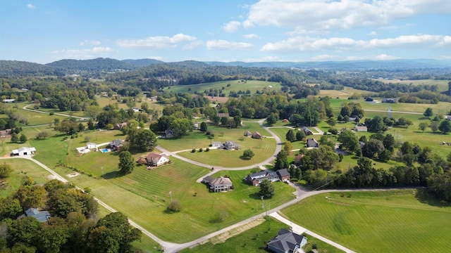 bird's eye view with a mountain view and a rural view