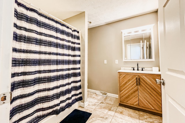 bedroom featuring ceiling fan, a textured ceiling, and hardwood / wood-style flooring