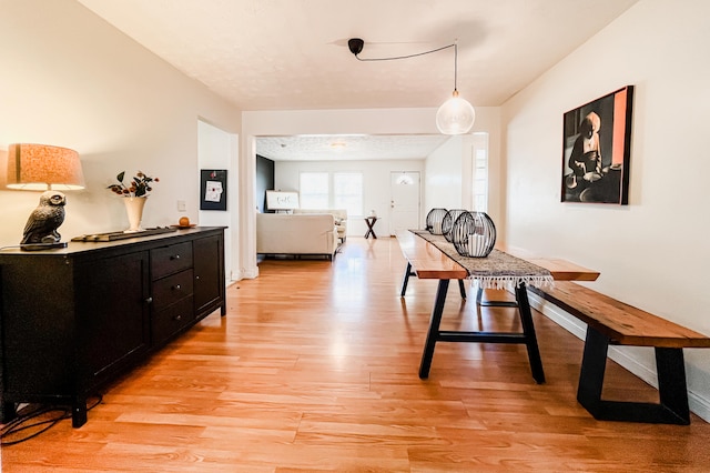 sitting room with light hardwood / wood-style flooring