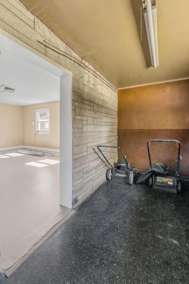 interior space featuring wooden walls