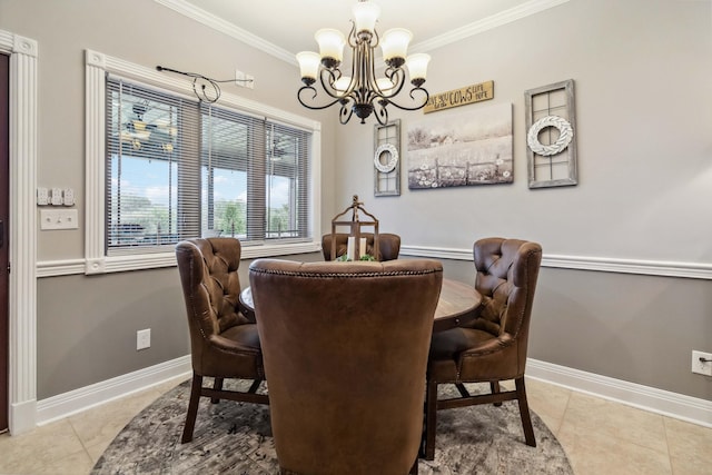 dining area with ornamental molding, a notable chandelier, and light tile patterned floors