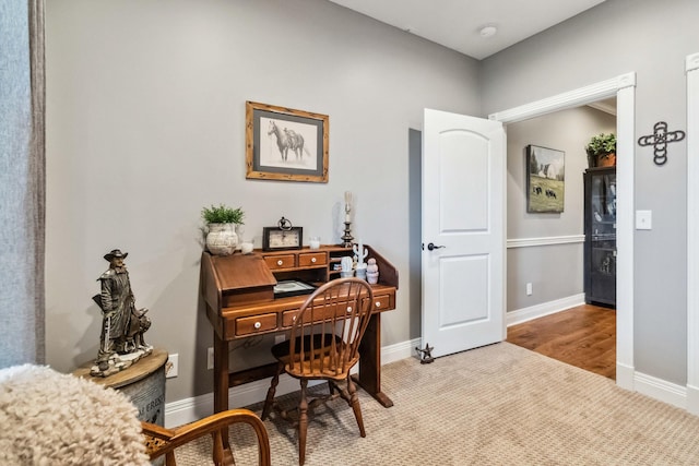 office with light hardwood / wood-style floors