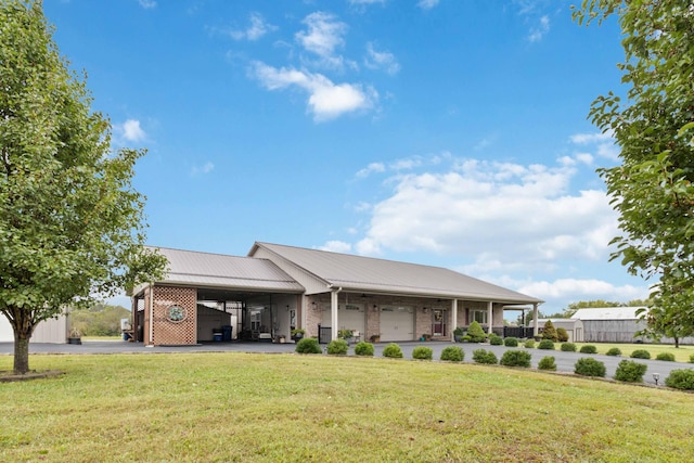 exterior space with covered porch and a front yard