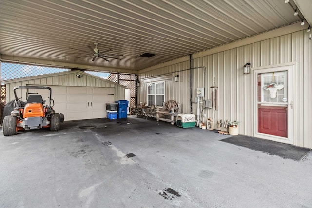 garage with ceiling fan