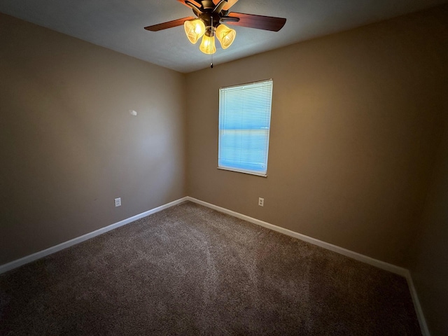 unfurnished room with carpet floors, ceiling fan, and baseboards