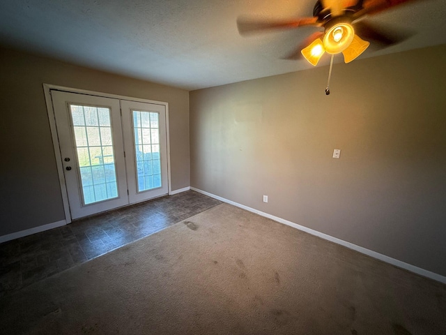 doorway with ceiling fan, dark colored carpet, and baseboards