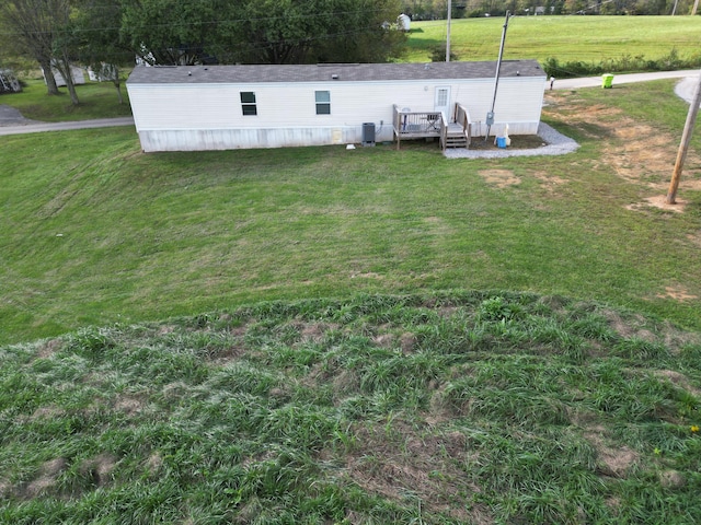 view of yard with a wooden deck