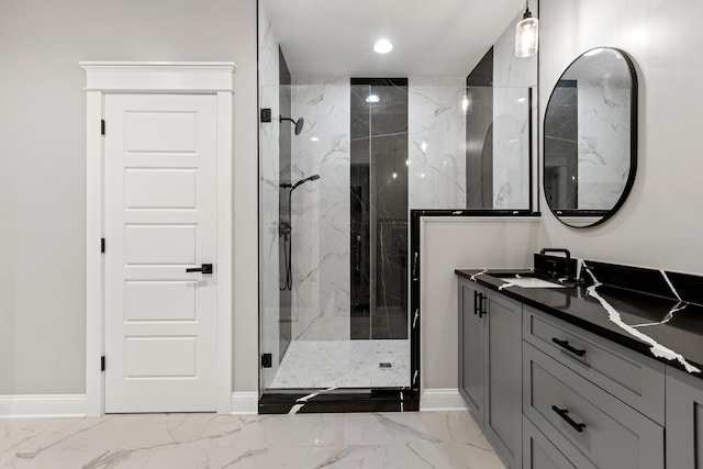 full bath featuring recessed lighting, vanity, baseboards, marble finish floor, and a marble finish shower