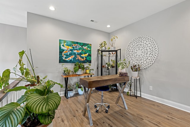 office area featuring recessed lighting, visible vents, baseboards, and wood finished floors