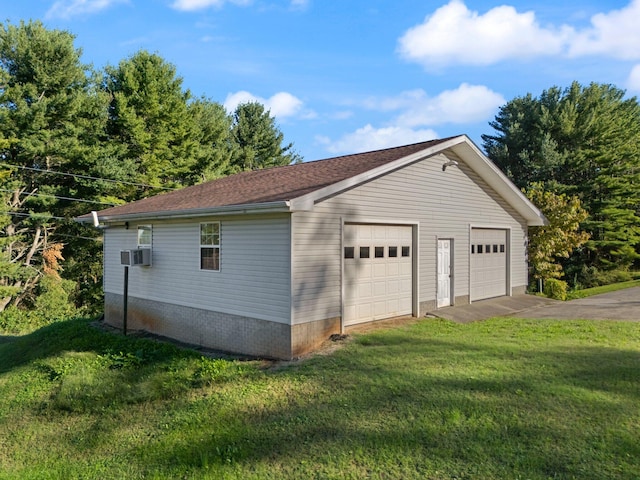 garage with a lawn