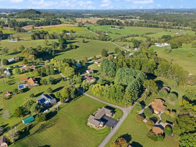 birds eye view of property featuring a rural view