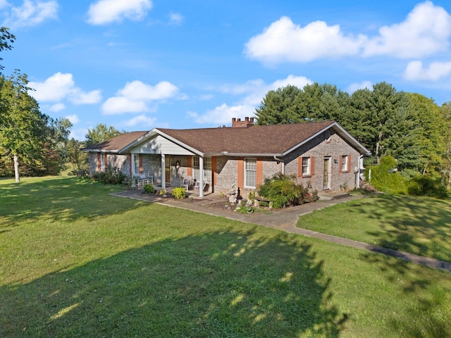 single story home with a front lawn and a porch