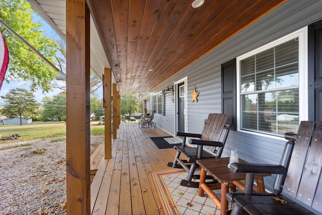 wooden deck with a porch