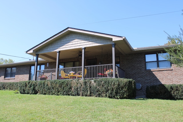 view of front of home with a front yard