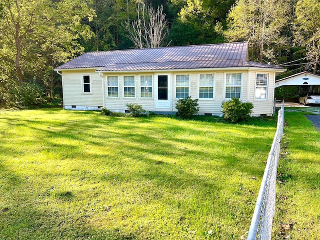 ranch-style home with a front lawn