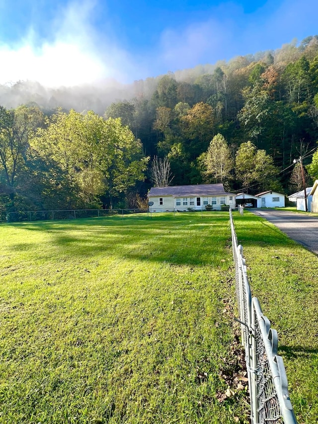 view of yard with a garage